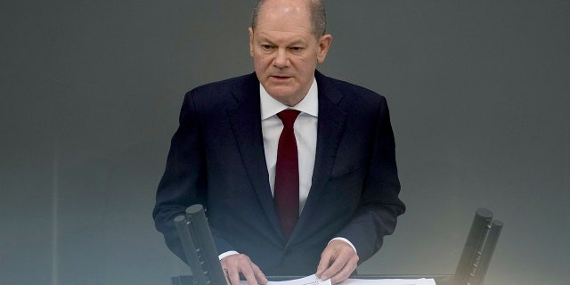 German Chancellor Olaf Scholz delivers a speech on the Russian invasion of the Ukraine