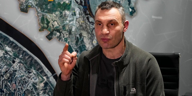 Vitali Klitschko, Kyiv Mayor and former heavyweight champion, gestures while speaking during his interview with the Associated Press in his office in City Hall in Kyiv, Ukraine, Feb. 27, 2022. 
