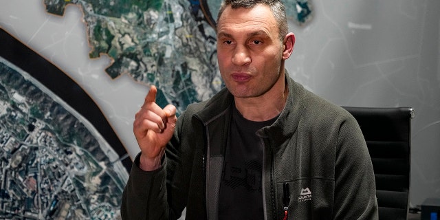 Vitali Klitschko, Kyiv Mayor and former heavyweight champion, gestures while speaking during his interview with the Associated Press in his office in City Hall in Kyiv, Ukraine, Feb. 27, 2022. 