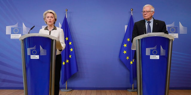 European Commission President Ursula von der Leyen, left, and EU foreign policy chief Josep Borrell make a joint press statement at EU headquarters in Brussels, Sunday, Feb. 27, 2022.