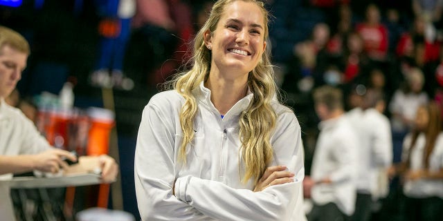 FILE - Florida interim head coach Kelly Rae Finley smiles before an NCAA college basketball game against South Carolina, Sunday, Jan. 30, 2022, in Gainesville, Fla. No. 23 Florida removed the interim tag from Kelly Rae Finley's title Monday, Feb. 28, 2022, and gave her a five-year contract to be the team's next head coach. Athletic director Scott Stricklin announced the decision in front of the team, a move that was received with applause and group hugs.