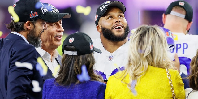 Aaron Donald #99 of the Los Angeles Rams looks up during the trophy ceremony during Super Bowl LVI at SoFi Stadium on February 13, 2022 in Inglewood, California. The Los Angeles Rams defeated the Cincinnati Bengals 23-20.