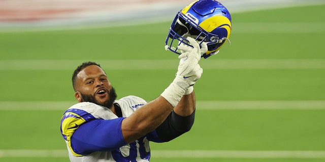 Los Angeles Rams' Aaron Donald #99 reacts after a fourth stoppage during the fourth quarter of Super Bowl LVI against the Cincinnati Bengals at SoFi Stadium on February 13, 2022 in Inglewood, California.