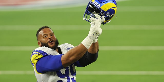 Aaron Donald #99 of the Los Angeles Rams reacts following a fourth down stop during the fourth quarter of Super Bowl LVI against the Cincinnati Bengals at SoFi Stadium on February 13, 2022 in Inglewood, California.