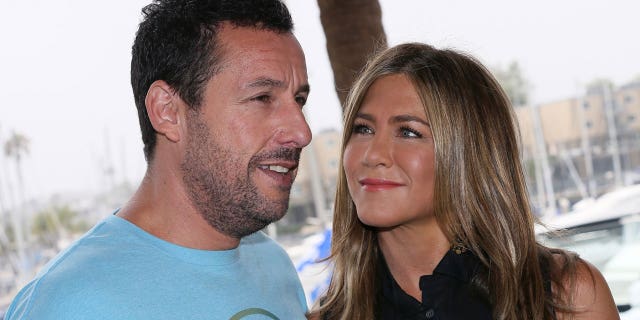 Adam Sandler and Jennifer Aniston attend a photocall for Netflix's "Murder Mystery."