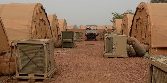 Heating Ventilation and Air Conditioning units operate behind tents at Nigerien Air Base 101, in Niger, April 3, 2017.