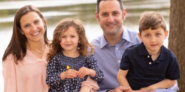 The Telep family of Connecticut. Young Michael "basically tries to bolt away from the mask," said the children's mom, Alexis.