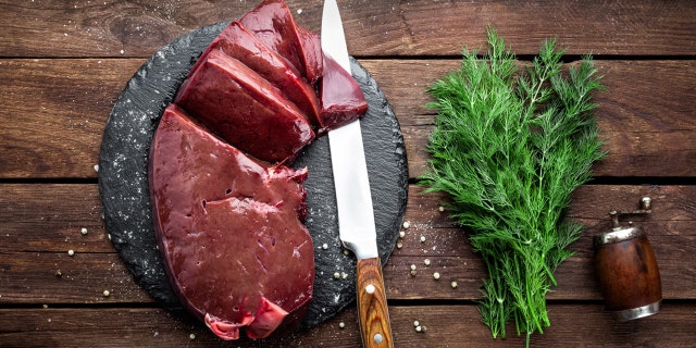 Raw liver on a cutting board