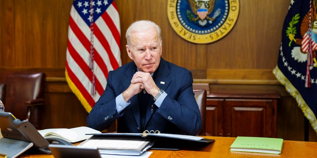 President Biden is seen at Camp David in Maryland during a phone call with Russian President Vladimir Putin Feb. 12, 2022. 