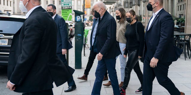 President Joe Biden leaves The Hamilton restaurant in Washington, Saturday, Feb. 19, 2022. Biden had lunch with granddaughters Finnegan Biden and Naomi Biden and Naomi's fiance Peter Neal. 