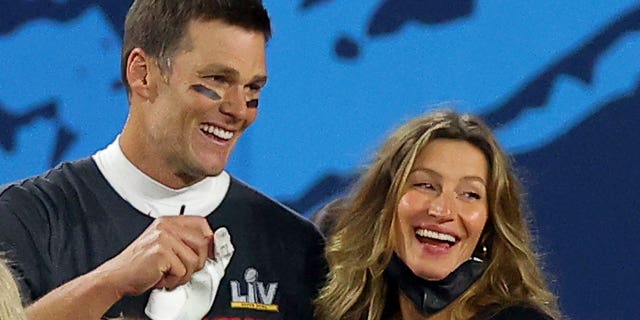 Tom Brady and wife Gisele Bundchen celebrate after he won Super Bowl LV in 2021.