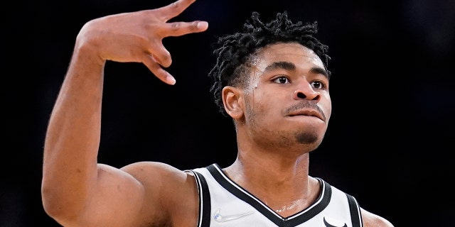 Brooklyn Nets guard Cam Thomas (24) celebrates after scoring in the final seconds of the second half of an NBA basketball game against the New York Knicks, Wednesday, Feb. 16, 2022, in New York.