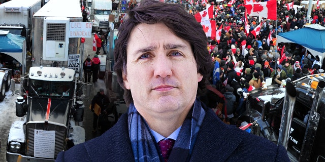 Supporters and truckers front the Parliament Hill during a protest in downtown of Ottawa, Canada, on February 12, 2022.  Justin Trudeau, Canada's prime minister, during a news conference from the National Capital Region in Canada on Monday, Jan. 31, 2022. 