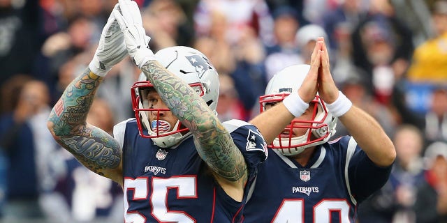 Tom Brady's ex-teammate Cassius Marsh talks QB's career, theorizes why he may not be done with football 3 Cassius Marsh # 55 and Trevor Reilly # 49 of the New England Patriots signal for a safety during the second quarter of a game against the Los Angeles Chargers at Gillette Stadium on Oct. 29, 2017, in Foxboro, Massachusetts.