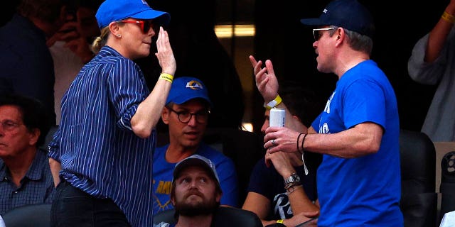 Charlize Theron was also photographed talking with Matt Damon.