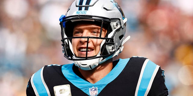 Christian McCaffrey of the Carolina Panthers looks on during the first half of a game against the Washington Football Team at Bank of America Stadium on Nov. 21, 2021, in Charlotte, N.C.