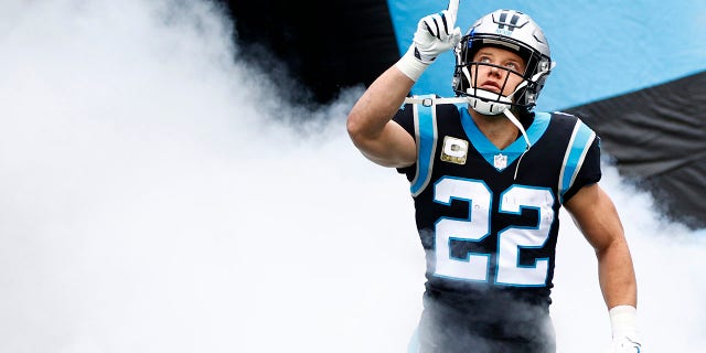 Christian McCaffrey #22 of the Carolina Panthers is introduced before the game against the Washington football team at Bank of America Stadium on November 21, 2021 in Charlotte, North Carolina.