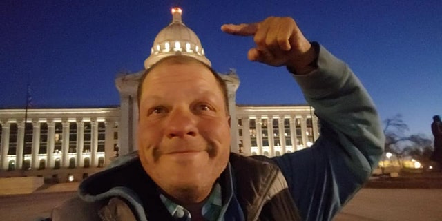 Barnes, 52, is cycling to all 50 U.S. state capitals in one year. At 6:30 a.m. CT on Monday morning, he reached the 26th capital on his journey — Oklahoma City.