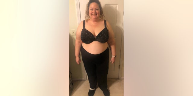 After having three children and the stresses of raising a family and the coronavirus pandemic, Dove had reached 297 pounds in January 2021.
