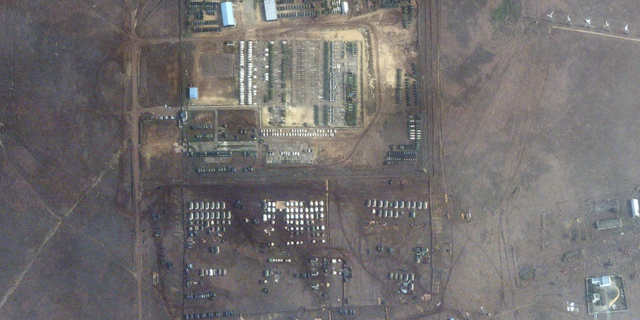This satellite image provided by Maxar Technologies shows troops gathered at a training ground in Novoozernoye, Crimea, on Tuesday.