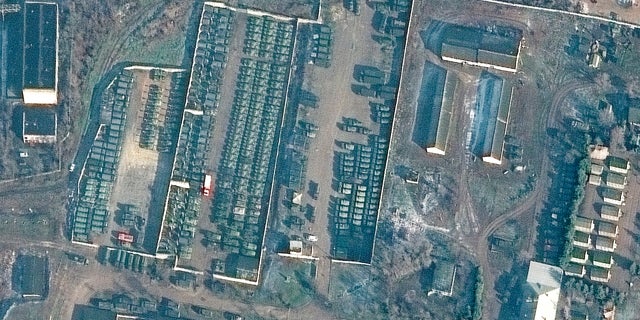 Troops and vehicles are seen gathered at Bakhchysarai, Crimea, on Tuesday.