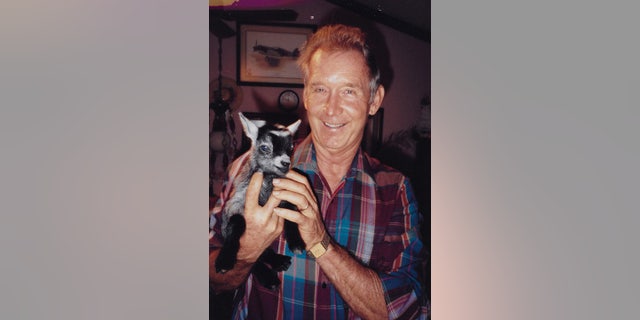 Don Lewis holding an animal before he vanished in 1997.