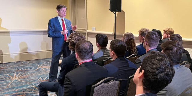 Republican Senate candidate Dr. Oz speak with the Pennsylvania College Republicans during a meeting at the Conservative Political Action Conference (CPAC) in Orlando, Florida on Feb. 25, 2022.