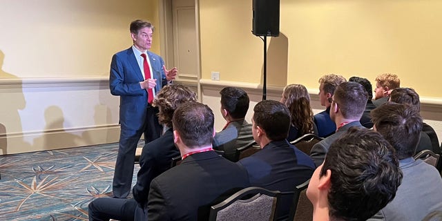 Republican Senate candidate Dr. Oz speaks with the Pennsylvania College Republicans during a meeting at the Conservative Political Action Conference (CPAC) in Orlando, Fla., Feb. 25, 2022.