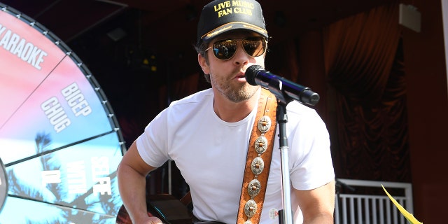 Dustin Lynch said he developed a penchant for performing as a child and has the "old VHS tapes" to prove it.