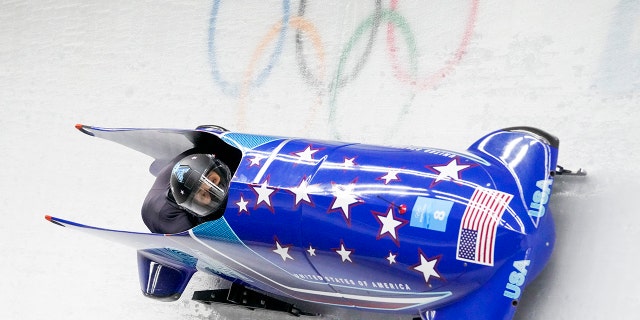 Elana Meyers Taylor and Sylvia Hoffman of the United States slide during the women's bobsled heat 3 at the 2022 Winter Olympics, Saturday, Feb. 19, 2022, in the Yanqing district of Beijing.