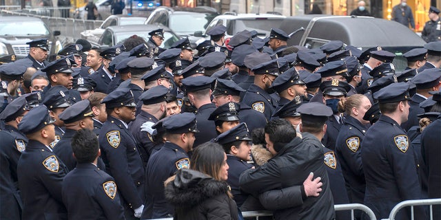 Scenes during the funeral of fallen NYPD Det. Wilbert Mora on Feb. 2, 2022.