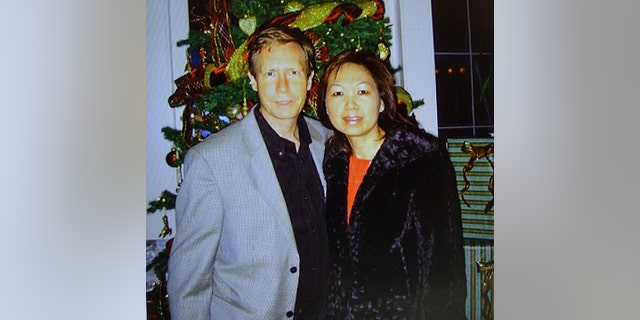 A photo of Peter and Quee Choo Chadwick is shown during a news conference announcing the capture of Peter Chadwick in Santa Ana, California, on Tuesday, Aug 6, 2019.