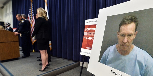 A photo of Peter and Quee Choo Chadwick is shown during a news conference announcing the capture of Peter Chadwick in Santa Ana, California, on Tuesday, Aug 6, 2019. 