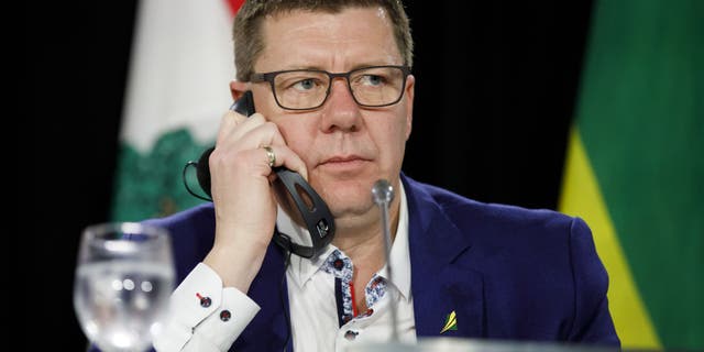Canadian provinces begin backing off vaccine mandates amid lingering Freedom Convoy protests 5 Saskatchewan Premier Scott Moe listens during a news conference following the Canada's Premiers meeting in Toronto, Ontario, Canada, on Monday, Dec. 2, 2019. (Cole Burston / Bloomberg via Getty Images)
