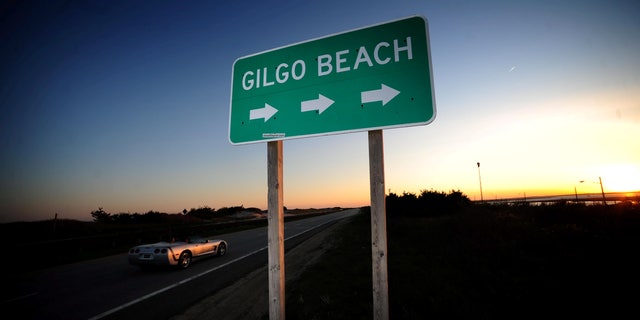 A sign along the west side of Ocean Parkway points to Gilgo Beach on Long Island on May 9, 2011. 