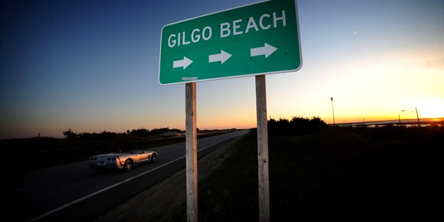 A sign along the west side of Ocean Parkway points to Gilgo Beach on Long Island on May 9, 2011.