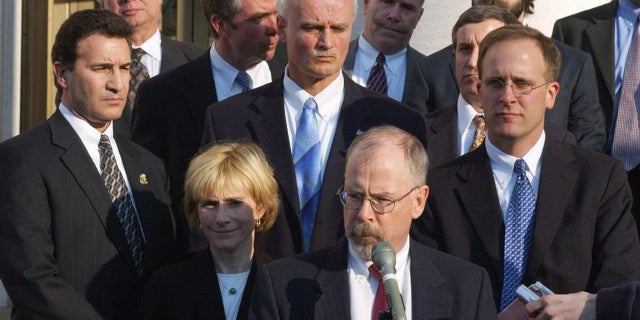 U.S. Attorney John Durham, center, outside federal court in New Haven, Connecticut, after the sentencing of former Gov. John Rowland. (Bob MacDonnell/Hartford Courant/Tribune News Service via Getty Images)