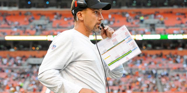 Defensive coordinator Dennis Allen of the New Orleans Saints talks into his headset prior to a preseason game against the Cleveland Browns at FirstEnergy Stadium on Aug. 10, 2017 in Cleveland, Ohio.