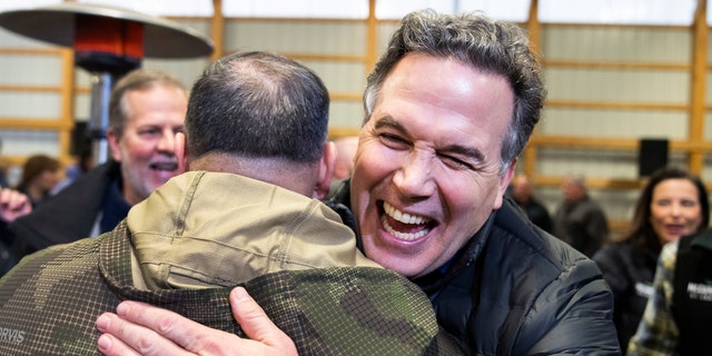 Dave McCormick, Republican Senate candidate from Pennsylvania, greets supporters during a campaign event with Sen. Ted Cruz, R-Texas, at Lehigh Valley Sporting Clays in Coplay, Pa., on Tuesday, January 25, 2022. (Photo By Tom Williams/CQ-Roll Call, Inc via Getty Images)