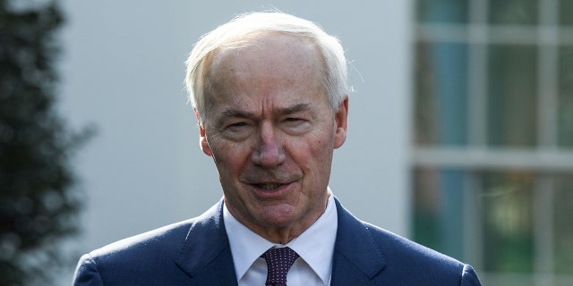 Arkansas Gov. Asa Hutchinson speaks to the press after a meeting of the National Governors' Association with President Joe Biden at the White House in Washington, DC, on January 31, 2022. (Photo by Nicholas Kamm / AFP) (Photo by NICHOLAS KAMM/AFP via Getty Images)