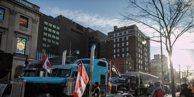 Truck drivers and supporters protest against vaccine mandates in the trucking industry in Ottawa, Ontario, on Jan.  31, 2022. (Photo by Amru Salahuddien / Anadolu Agency via Getty Images)