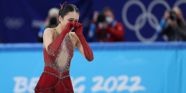 Zhu Yi of China reacts after the figure skating team event women's single skating free skating at Capital Indoor Stadium in Beijing, capital of China, Feb. 7, 2022. 