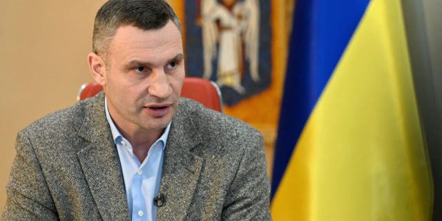 Heavyweight boxing champion turned Kyiv mayor Vitali Klitschko, talks to AFP journalists at his office in Kyiv on Feb. 10, 2022. 