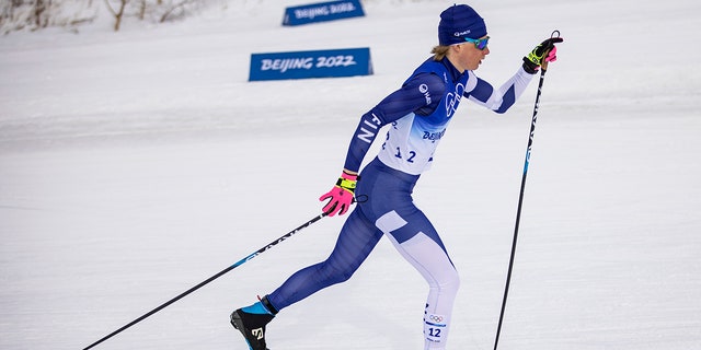 Remi Lindholm of Finland in action competes during the men´s 15km classic cross-country skiing during the Beijing 2022 Winter Olympics at The National Cross-Country Skiing Centre on February 11, 2022, in Zhangjiakou, China. (Photo by Tom Weller/VOIGT/DeFodi Images via Getty Images)