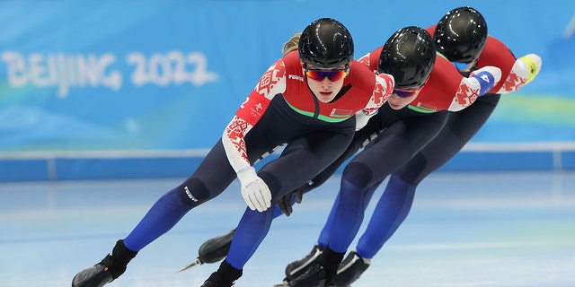 Athletes of Belarus compete during the speed skating women's team pursuit quarterfinal at the National Speed Skating Oval in Beijing, capital of China, Feb. 12, 2022. 