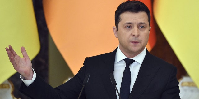 Ukrainian President Volodymyr Zelensky holds a joint press conference with the German chancellor in Kyiv on Feb. 14, 2022.