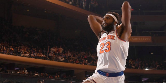 Mitchell Robinson of the New York Knicks drives to the basket during a game against the Oklahoma City Thunder Feb. 14, 2022, at Madison Square Garden in New York City.