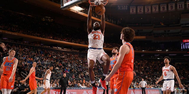 Mitchell Robinson (23) of the New York Knicks dunks the ball during a game against the Oklahoma City Thunder Feb. 14, 2022, at Madison Square Garden in New York City.