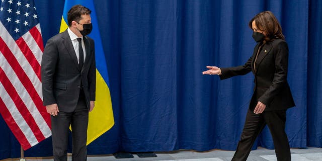 Feb 19, 2022: US Vice President Kamala Harris (R) and Ukrainian President Volodymyr Zelenskyy arrive for photos before meeting together at the Munich Security Conference (MSC) in Munich, southern Germany. (Photo by ANDREW HARNIK/POOL/AFP via Getty Images)