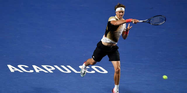 Alexander Zverev of Germany hits a return during men's singles first round at the 2022 ATP Mexican Open tennis tournament in Acapulco, Mexico, Feb. 22, 2022. 